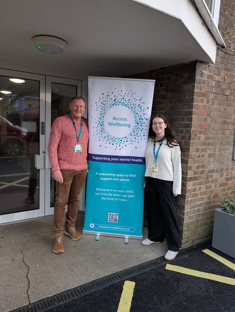 Two members of the Access Wellbeing Purbeck team outside the new Wool drop-in