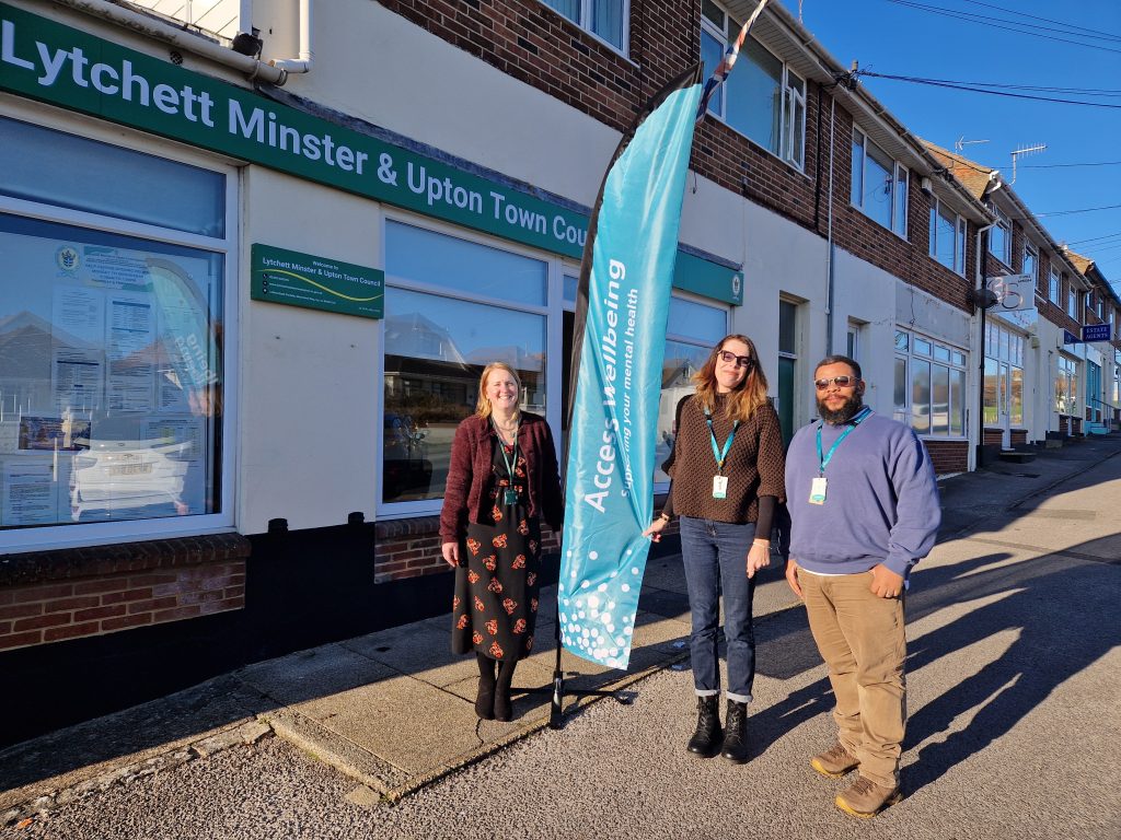 Members of the Access Wellbeing team standing outside the new Upton and Lytchett Minster drop-in